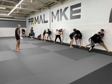 Unleashing Potential: Why Coaches Need to Take a Leap of Faith and Trust Athletes' Self-Organization - Primal MKE - MMA Fitness BJJ Grappling kickboxing best milwaukee west allis