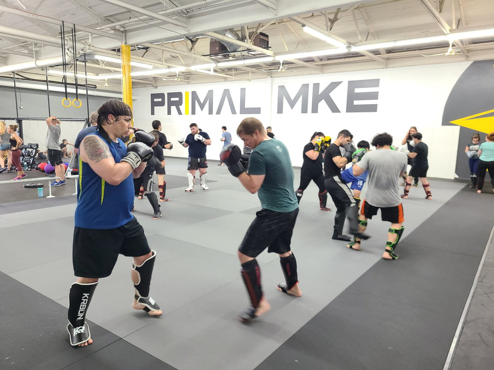 At Primal, we spar on day one! - Primal MKE - MMA Fitness BJJ Grappling kickboxing best milwaukee west allis